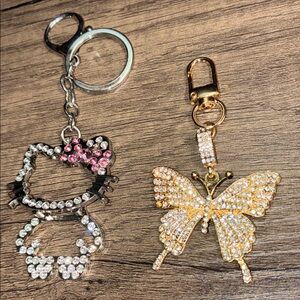 Elegant Gold Butterfly and Silver Hello Kitty Heavy Metal Keychain Set